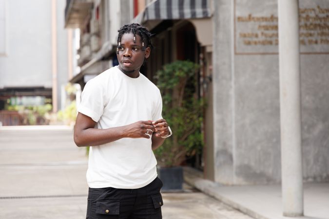 Black man standing outside