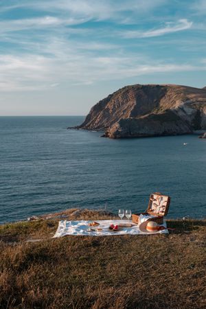 Picnic mat with romantically set near sea and mountains