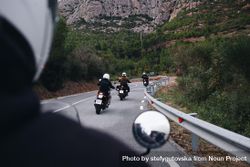 POV of bike rider following friends on motorcycles bEra70