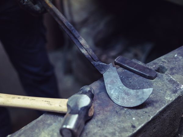 Crop blacksmith showing metal detail on anvil