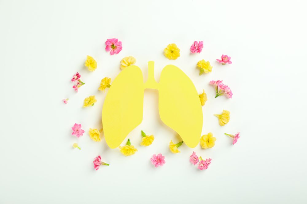Yellow lungs surrounded with flowers
