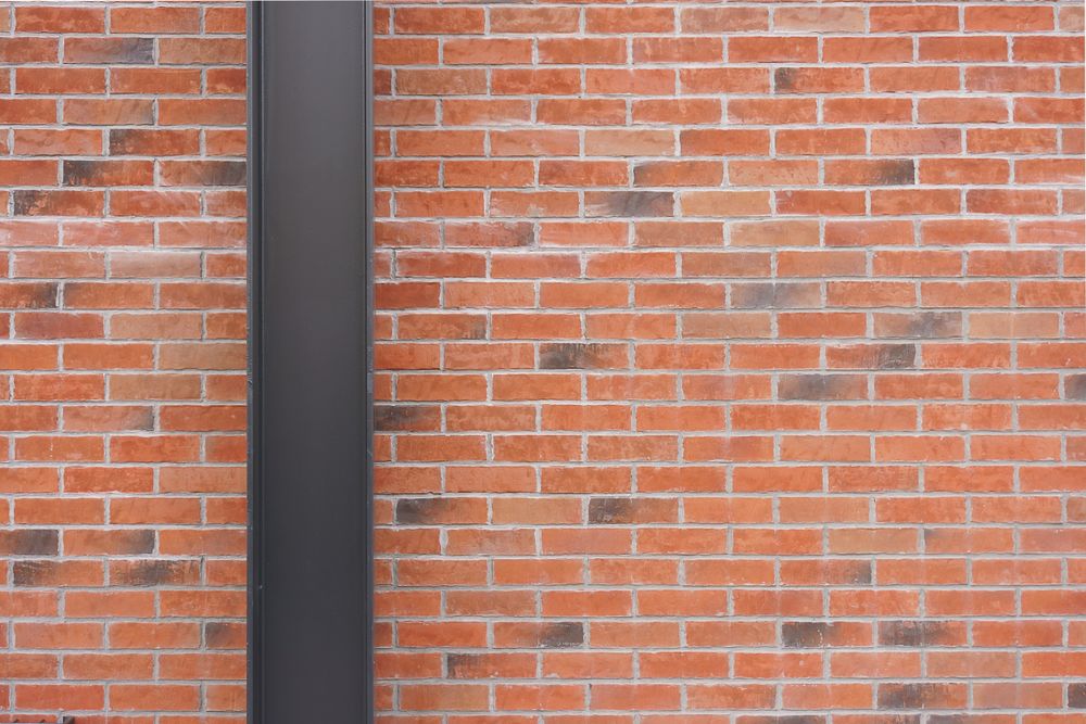 Steel structure and red brick wall texture