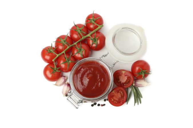 Tomatoes, sauce and ingredients isolated on neutral background