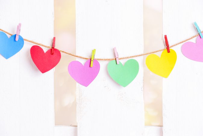 Colorful paper hearts on a string