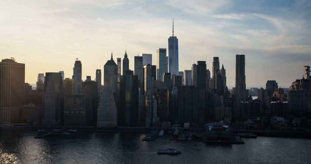 Aerial Cityscape of a New York City Downtown Area in Lower Manhattan. Urban Landscape with Office Buildings and Historic Skyscrapers. Panoramic Shot of an Iconic Travel Destination in North America