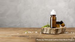 Arrangement with essential oils on wooden table bxopj4