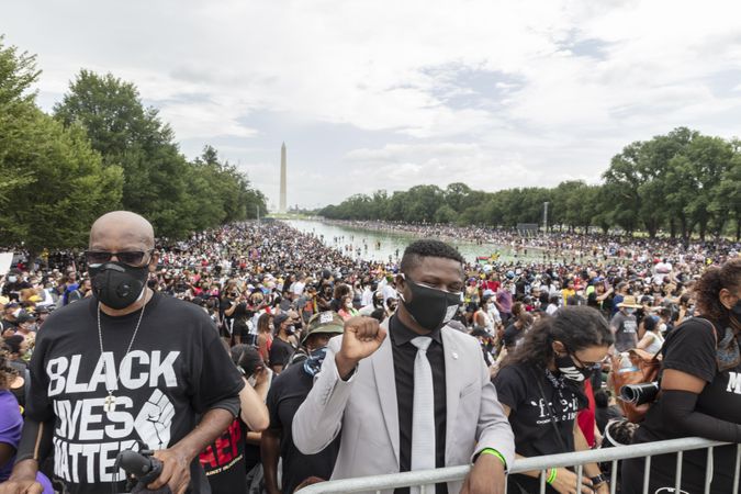 Large group of people at a BLM protest with the Lincoln Memorial, Washington, D.C.
