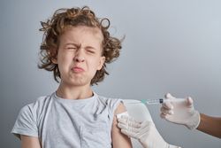 Afraid child before vaccination