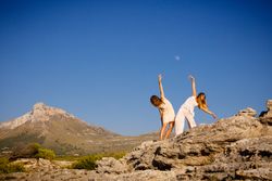 Young women posing on stones
