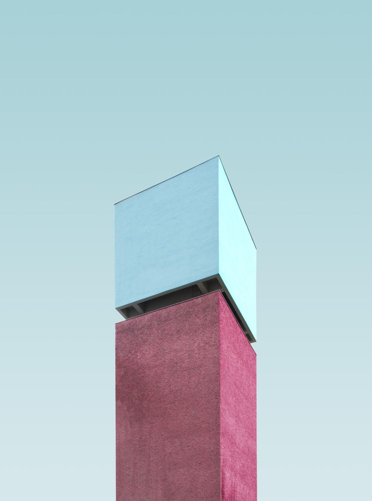 Red and blue building against the sky