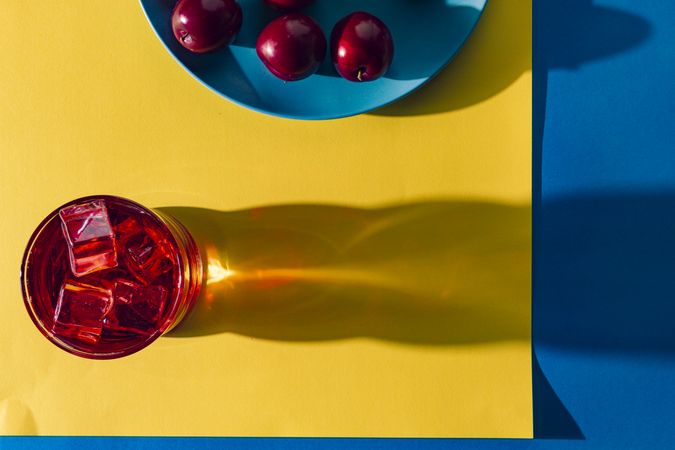Red drink near fresh fruits