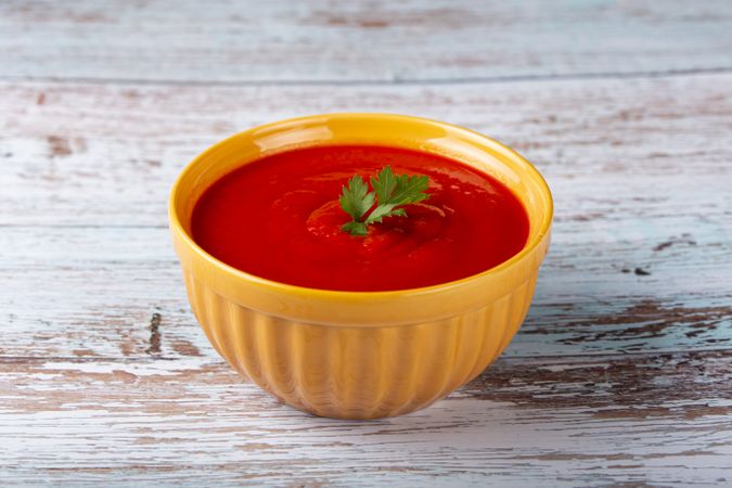 Delicious homemade tomato soup in bowl.