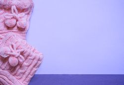 Close up with booties on purple paper