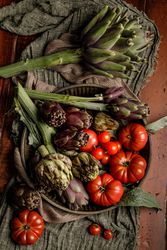 Assorted vegetables and napkins on table