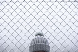 Faceless body infant of fence