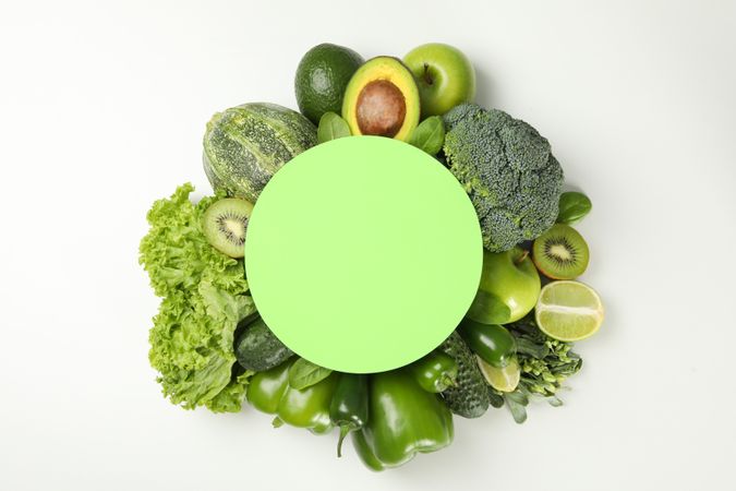 Fresh green vegetables and space for text on blank background
