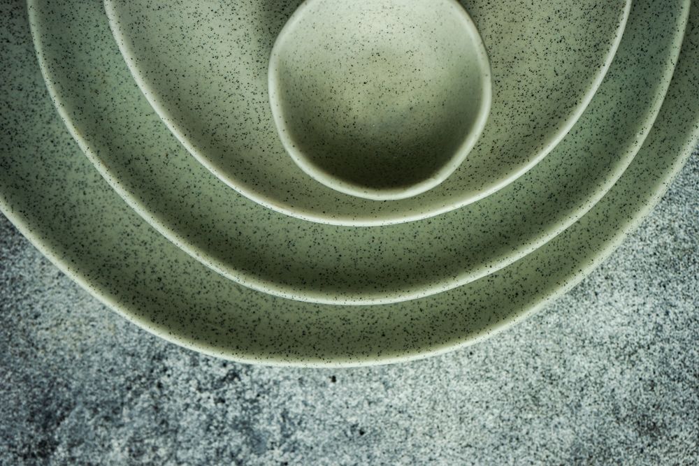 Top view of round geometric plates on counter