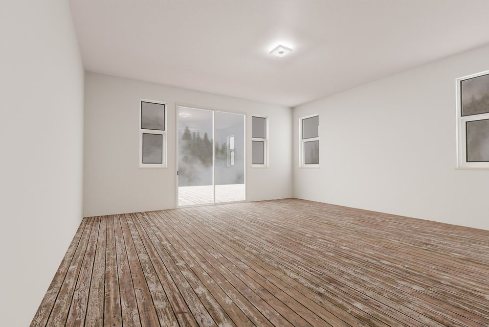 Raw Unfinished Room of House with Blank Walls and Worn Wood Floors.