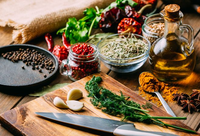 Spices and oil near knife