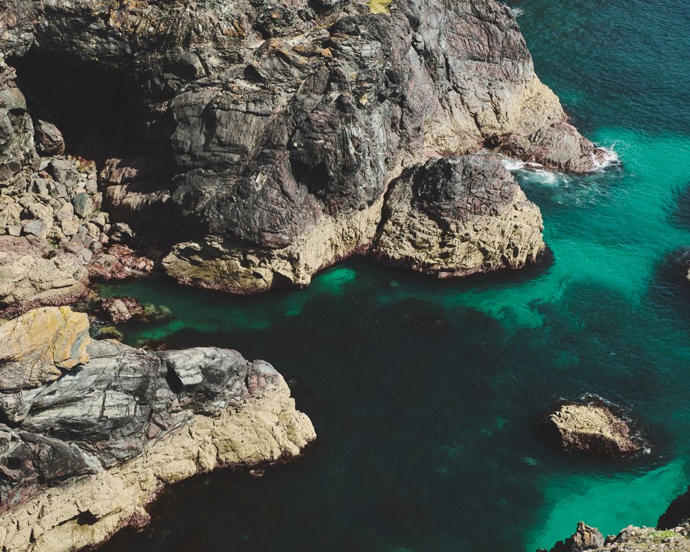Looking down at the water and rocks in the British seaside