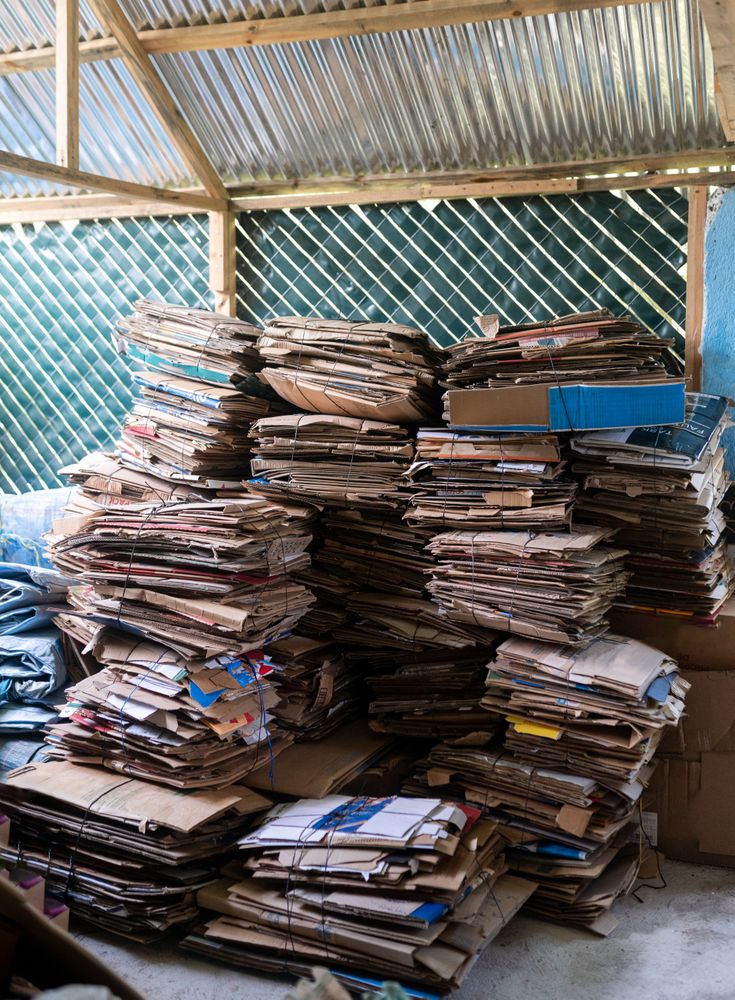 Recycled Cardboard Stacks in Warehouse Storage