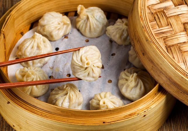 Chinese steamed dumplings out of bamboo steamer