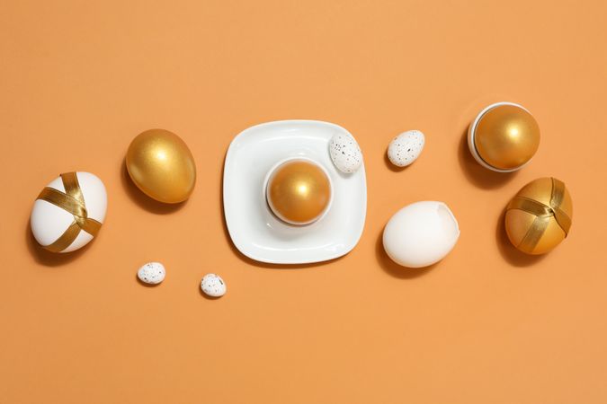 Concept of Richness, golden eggs, top view