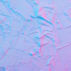 Paint background in vibrant bold gradient holographic colors