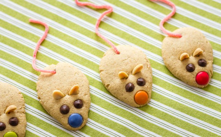 Cookies with mouse shaped and red licorice tail