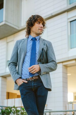 Businessman posing in the street