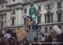 London, England, United Kingdom - June 6th, 2020: Protesters climb statue by Houses of Parliament 5zrpA5
