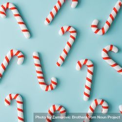 Candy Canes On Bright Blue Background - Free Photo (5aPaG0) - Noun Project