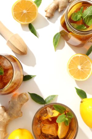 Cold tea with fresh oranges and mint leaves