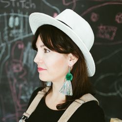 Portrait of model with handmade earrings