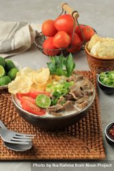 Soto betawi, bowl of Indonesian beef stew 5nzJ25