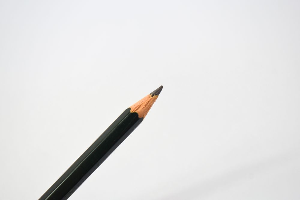 Pencil diagonally across picture with copy space