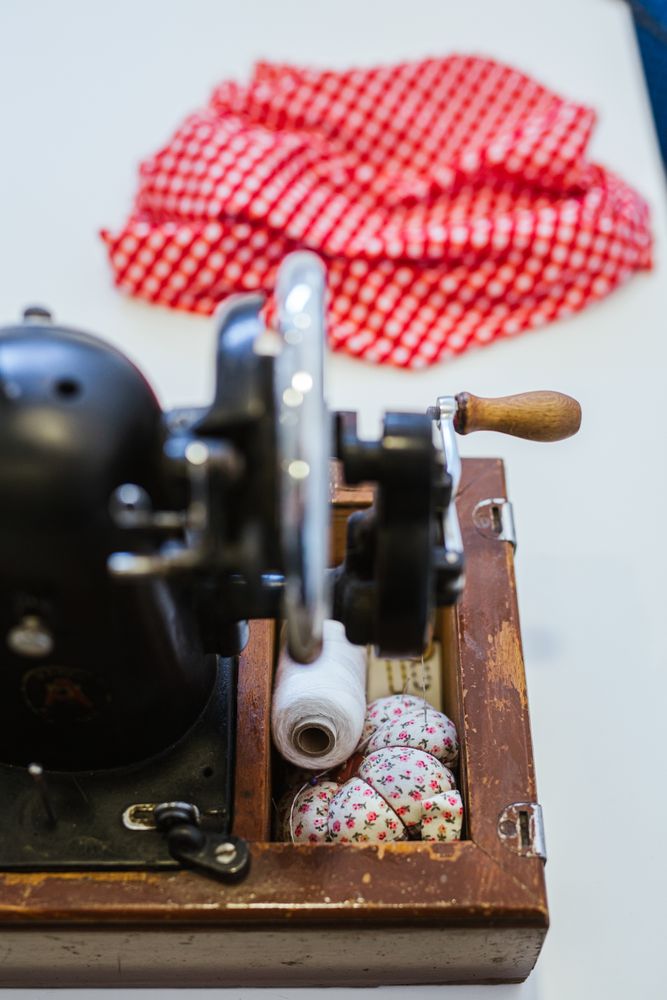 Woman in a sewing school