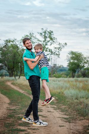 Affectionate father with son outdoor
