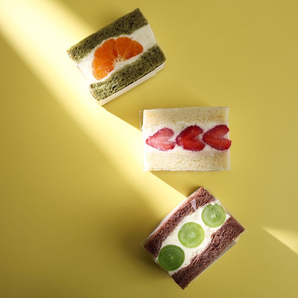 Top View Japanese Fruit Sandwith or Fruit Sando on Yellow Background