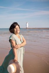 Woman gazing at sea horizon