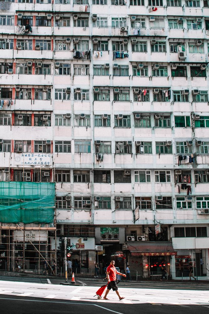 Man walking near building at daytime