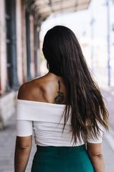 Rear view of young woman with long hair