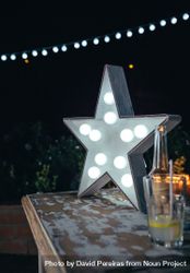Star lamp with light bulbs on bar table 432gyX