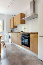 Kitchen interior with furniture and appliances