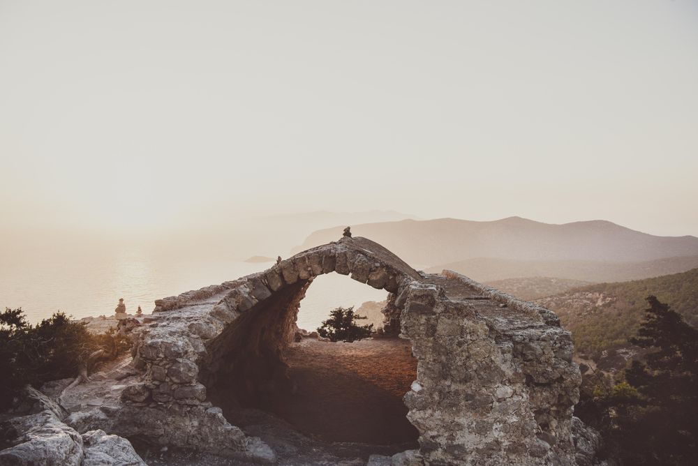 Stone structure of old Greek castle over looking sea