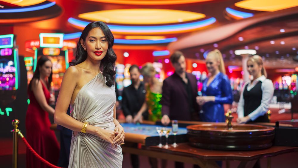 Commercial Footage Portrait of a Sophisticated Asian Woman in a Stunning Dress Posing and Looking at Camera