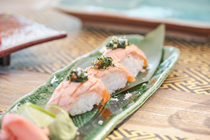Delicious sake nigiri sushi on plate
