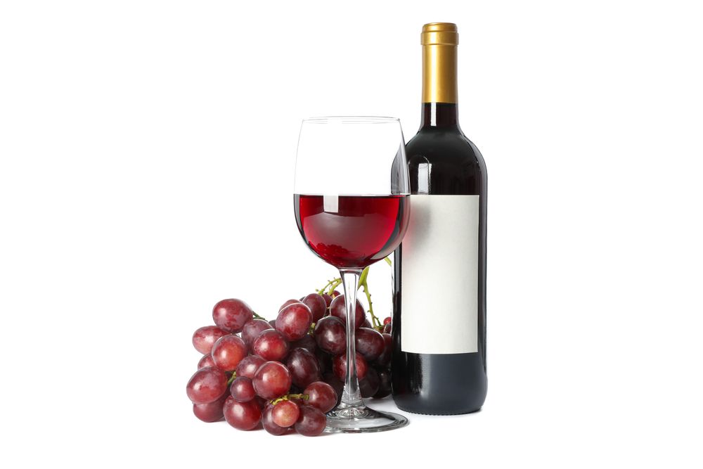 Grapes, bottle and glass with wine isolated on blank background
