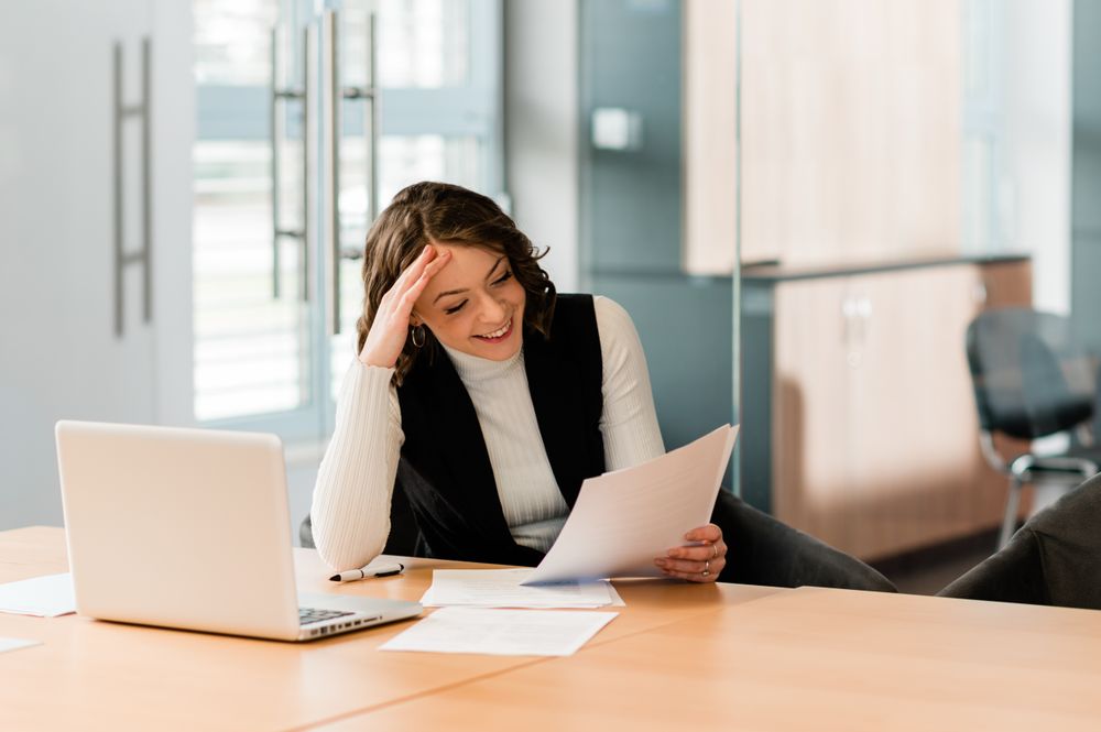 Woman working on her laptop in the office