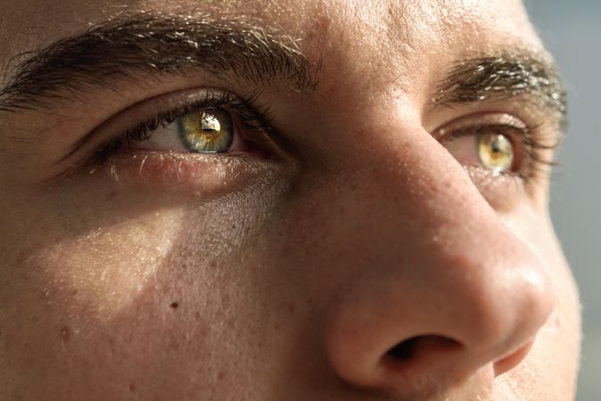 Man with green eyes, close up